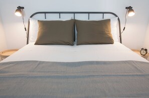 1 bedroom, desk, iron/ironing board, travel crib