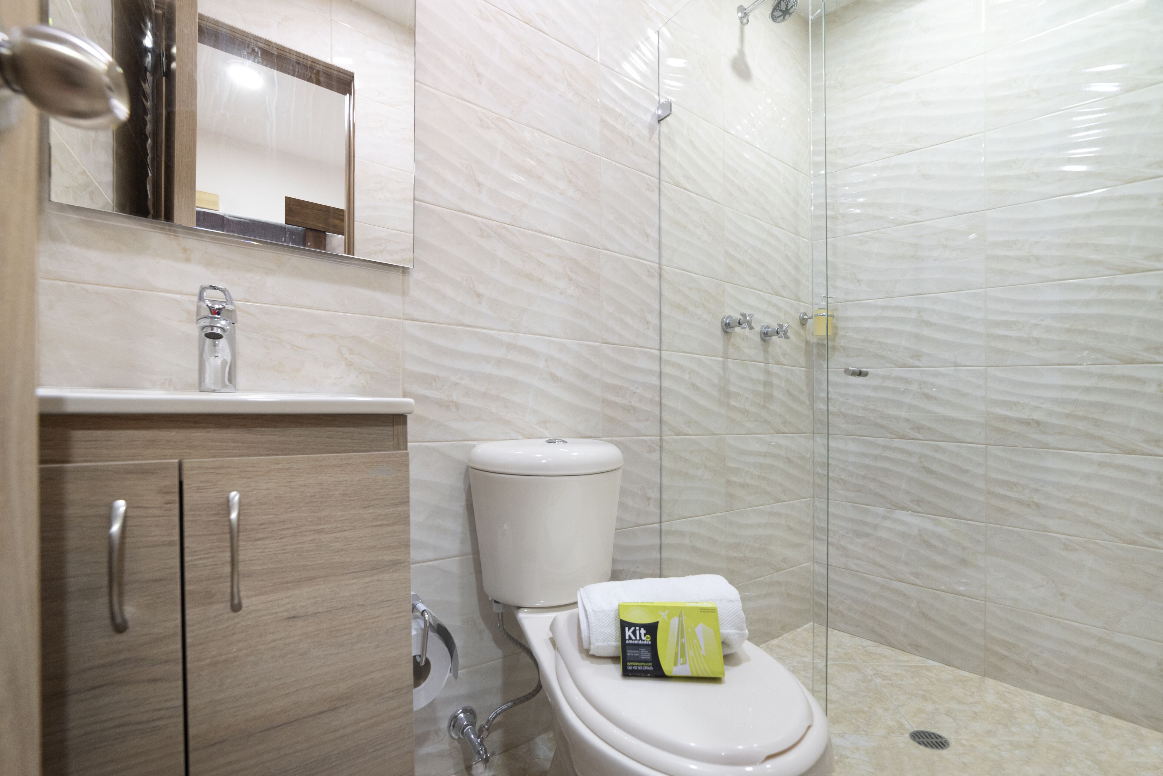 shower, designer toiletries, towels, soap