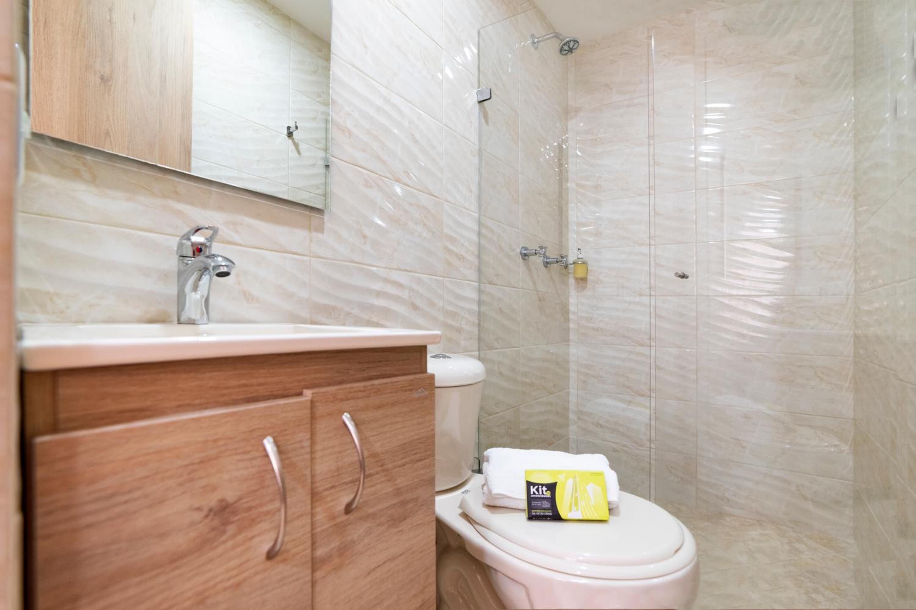 shower, designer toiletries, towels, soap