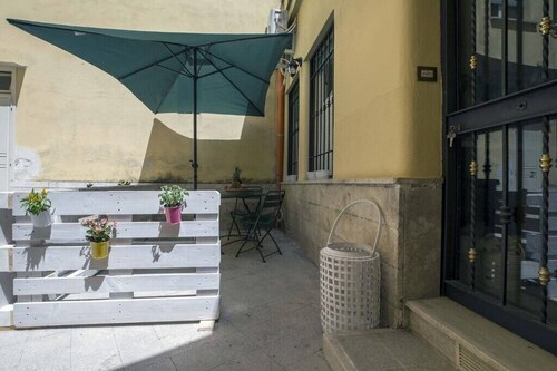 The Courtyard of Via Tuscolana