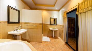 Shower, jetted tub, towels, soap