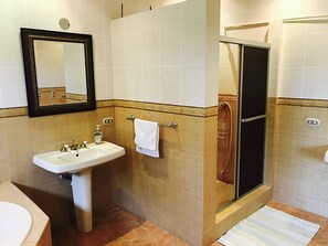 Shower, jetted bath, towels, soap