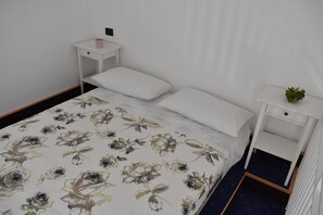1 bedroom, desk, iron/ironing board, travel cot