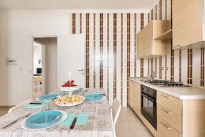 Fridge, stovetop, cookware/dishes/utensils
