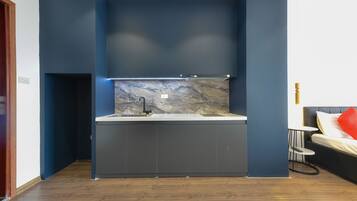 Panoramic Apartment | Private kitchenette | Microwave, electric kettle, paper towels