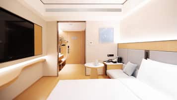 Kamar Double Bisnis | 1 kamar tidur, minibar, meja kerja, dan tirai kedap cahaya