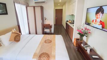 Design Studio, 1 Bedroom | Minibar, in-room safe, desk, free WiFi