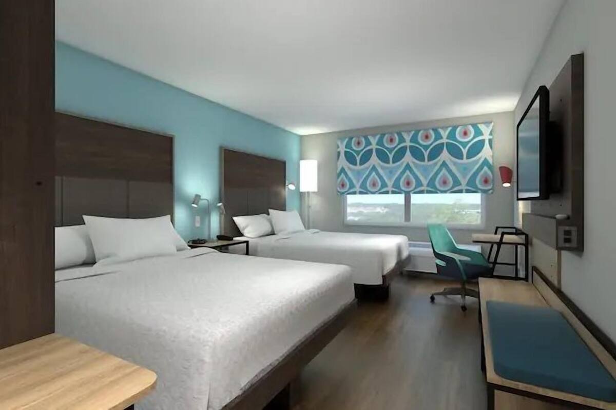 Desk, blackout curtains, iron/ironing board, bed sheets