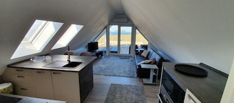 Appartement exclusif au dernier étage avec grande terrasse sur le toit