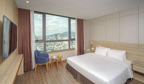 Deluxe Double Room, City View | Minibar, in-room safe, desk, laptop workspace - G8 Luxury Hotel and Spa Da Nang (Da Nang)