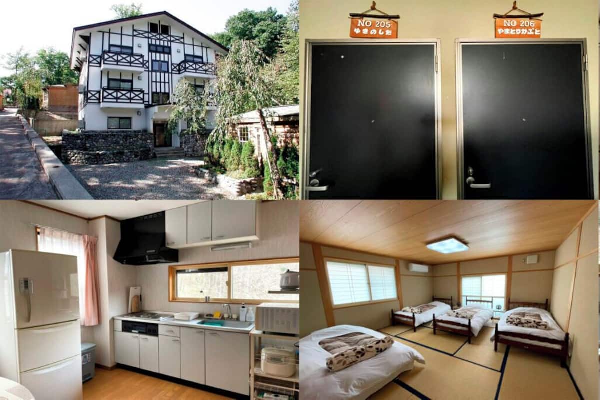 A traditional Japanese-style hotel with a modern kitchen, two bedrooms with tatami mats, and a dining area.