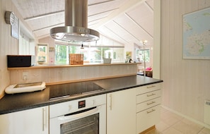 Fridge, stovetop, dishwasher, coffee/tea maker
