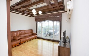 Suite, 2 chambres | Coin séjour