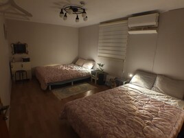 Habitación Deluxe (303) | Decoración individual, mobiliario individual, cortinas opacas