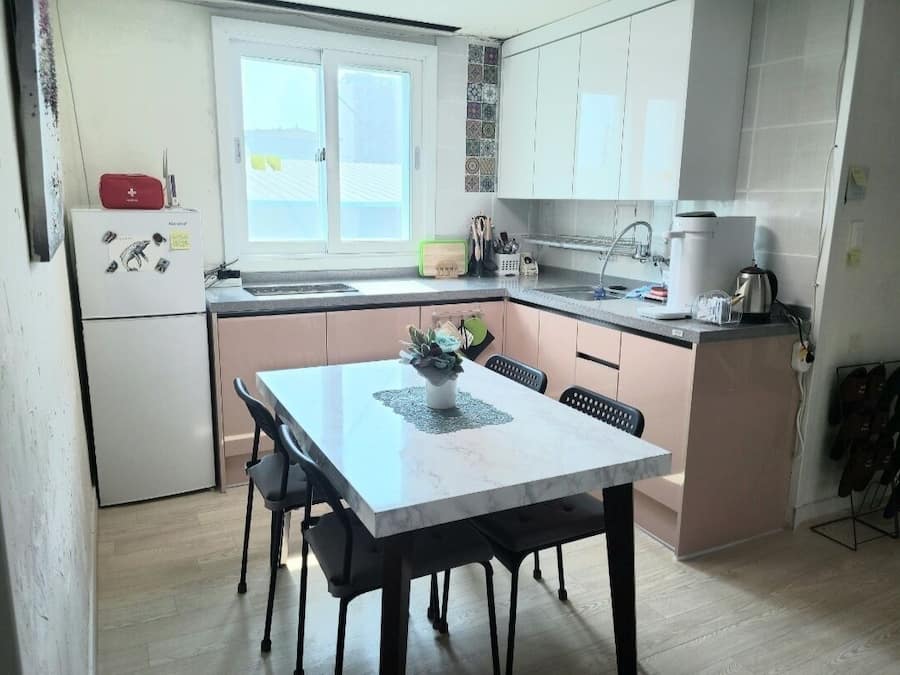 Deluxe Room (303) | Shared kitchen | Fridge, microwave, stovetop, electric kettle