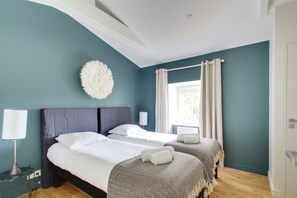 4 slaapkamers, een strijkplank/strijkijzer, gratis wifi, beddengoed