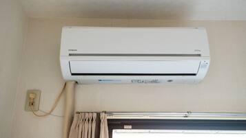 Quadruple Room | Air conditioning