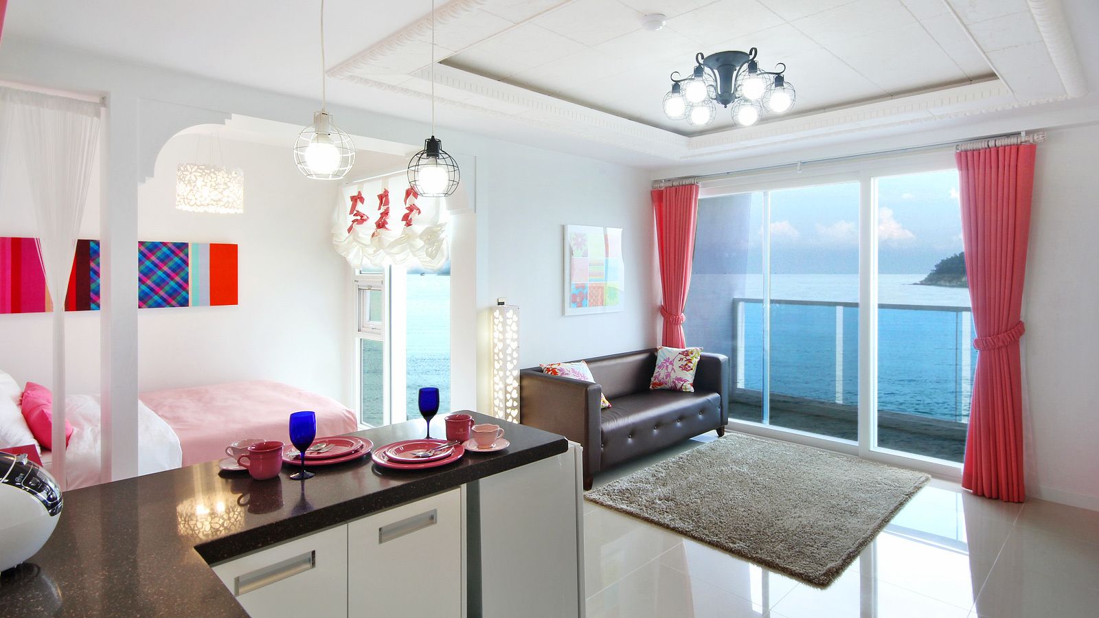 Deluxe Studio | Living area | Flat-screen TV