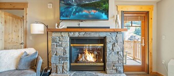 2 bedroom with incredible views and direct ski in and out! Hot tub/underground parking/gym