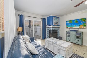 Smart TV, fireplace, books