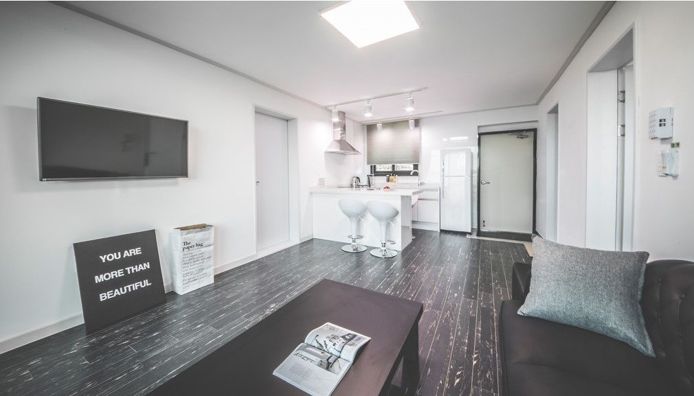 suite, 2 bedrooms | living area | flat-screen tv, heated floors