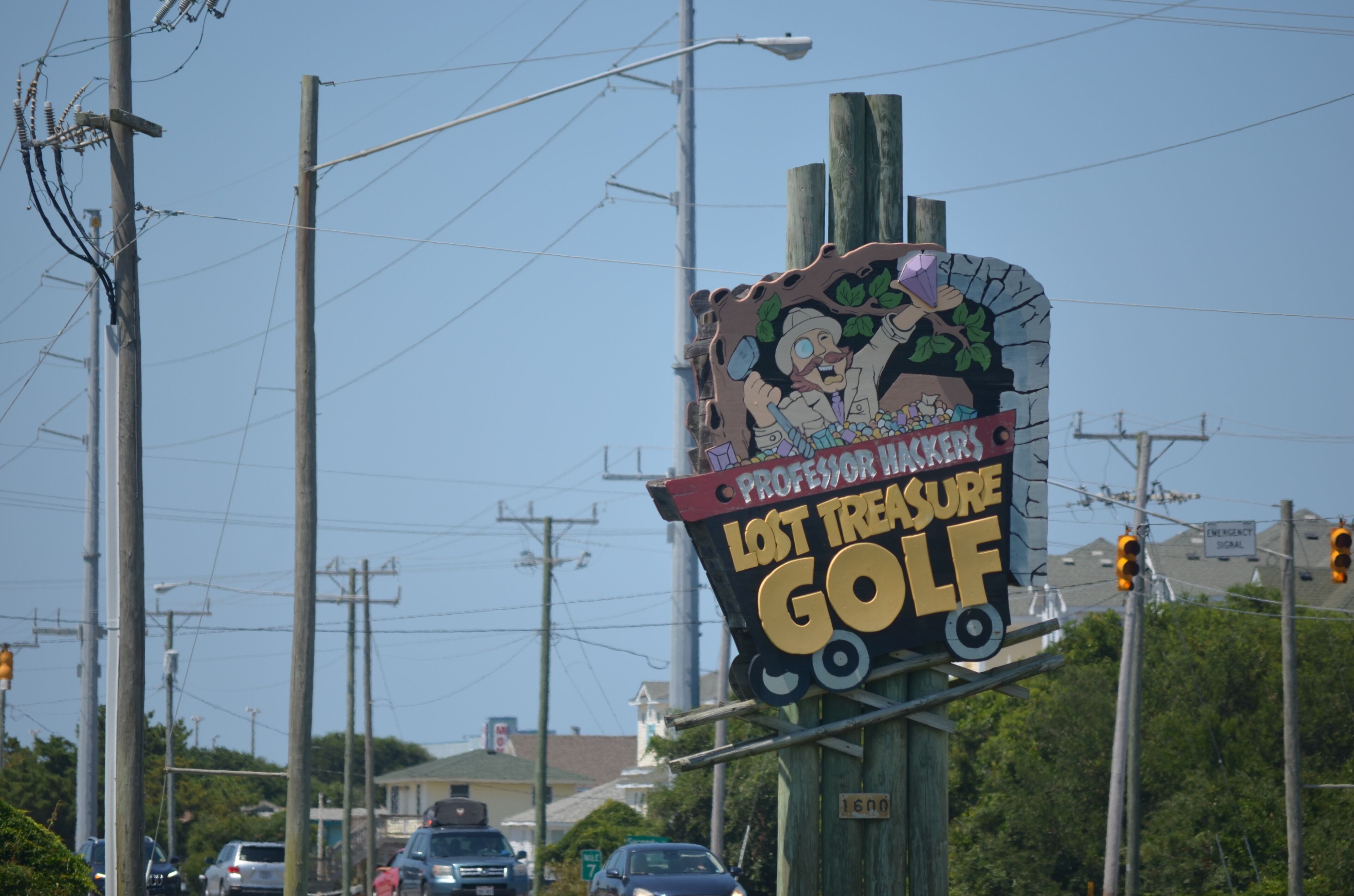 A signboard advertising a lost treasure golf course.