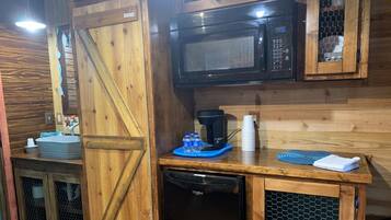 Fridge, microwave, coffee/tea maker, paper towels