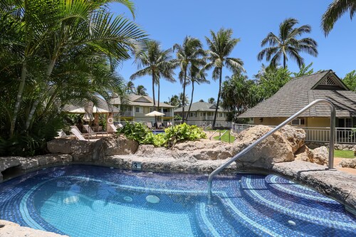 Open concept home with pool, hot tub, & beach access in a gated community