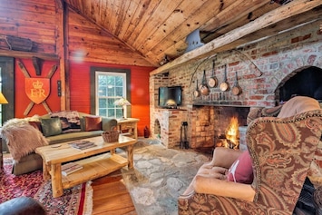 Cozy up in this charming cabin with your loved ones.