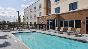 Outdoor pool, pool umbrellas, sun loungers