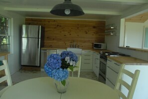 Microwave, dishwasher, coffee/tea maker, cookware/dishes/utensils