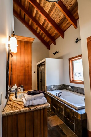 Bathtub, hair dryer, towels, soap