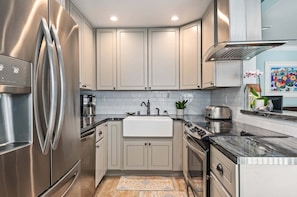 Coffee/tea maker, fridge, microwave, dining table - Beachfront Ground Floor Condo | King Bed Ocean Views Private Patio (Carpinteria)