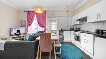 Standard Apartment | Private kitchen | Fridge, microwave, oven, stovetop