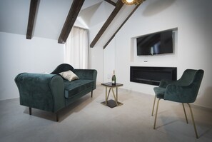 Kattohuoneisto | Oleskelualue | Taulutelevisio