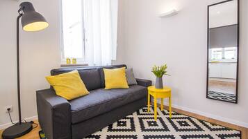 Apartment, 1 Bedroom | Living area | Flat-screen TV