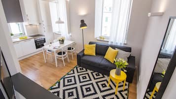 Apartment, 1 Bedroom | Living area | Flat-screen TV