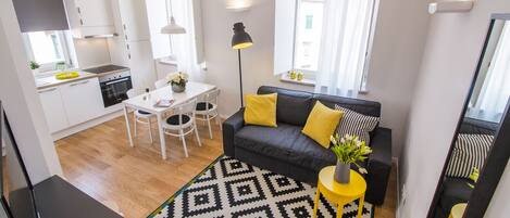 Apartment, 1 Bedroom | Living area | Flat-screen TV