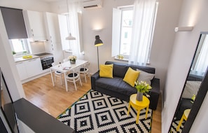 Apartment, 1 Bedroom | Living area | Flat-screen TV
