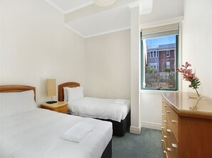2 habitaciones y ropa de cama