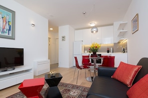 Apartment, 1 Bedroom (City center, Garage, Lift) | Living area | Flat-screen TV
