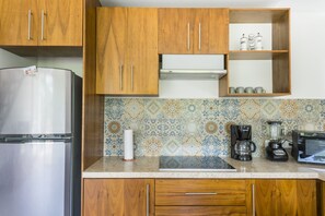 Fridge, microwave, stovetop, coffee/tea maker