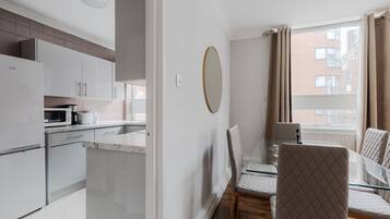 Deluxe Apartment, Private Bathroom, City View | Interior