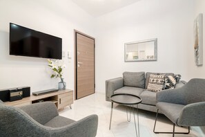 Deluxe Apartment | Living area | Flat-screen TV - Apartment Hermes in Central Athens (Athens)
