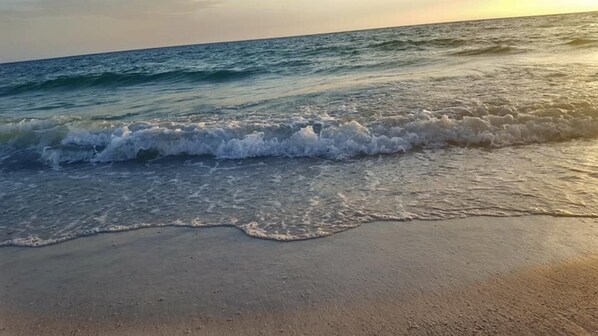On the beach, sun-loungers, beach towels