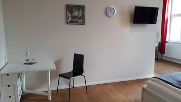 Double Room, Courtyard Area | Living area | Flat-screen TV