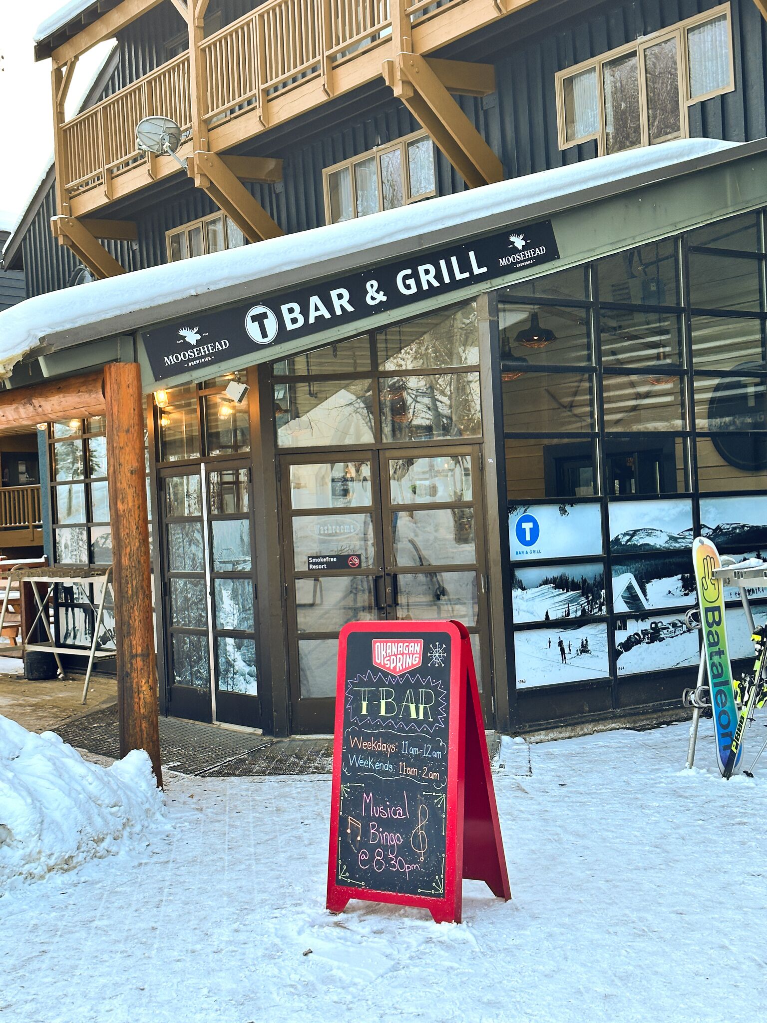 A bar and grill with a signboard advertising a musical bingo event.