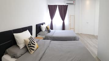 Down comforters, blackout drapes, iron/ironing board, free WiFi