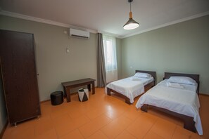 Standard Twin Room | Iron/ironing board, free WiFi, bed sheets
