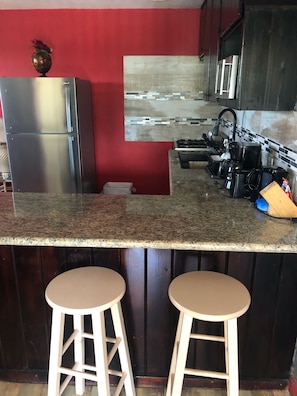 Fridge, microwave, oven, stovetop - Exuma Home Rentals: beach is short drive away by using one of our rentals! (George town)